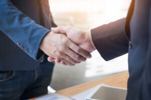 two men shaking hands