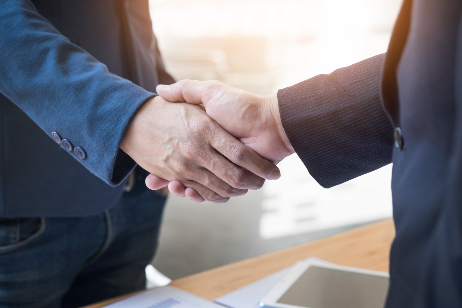 two men shaking hands