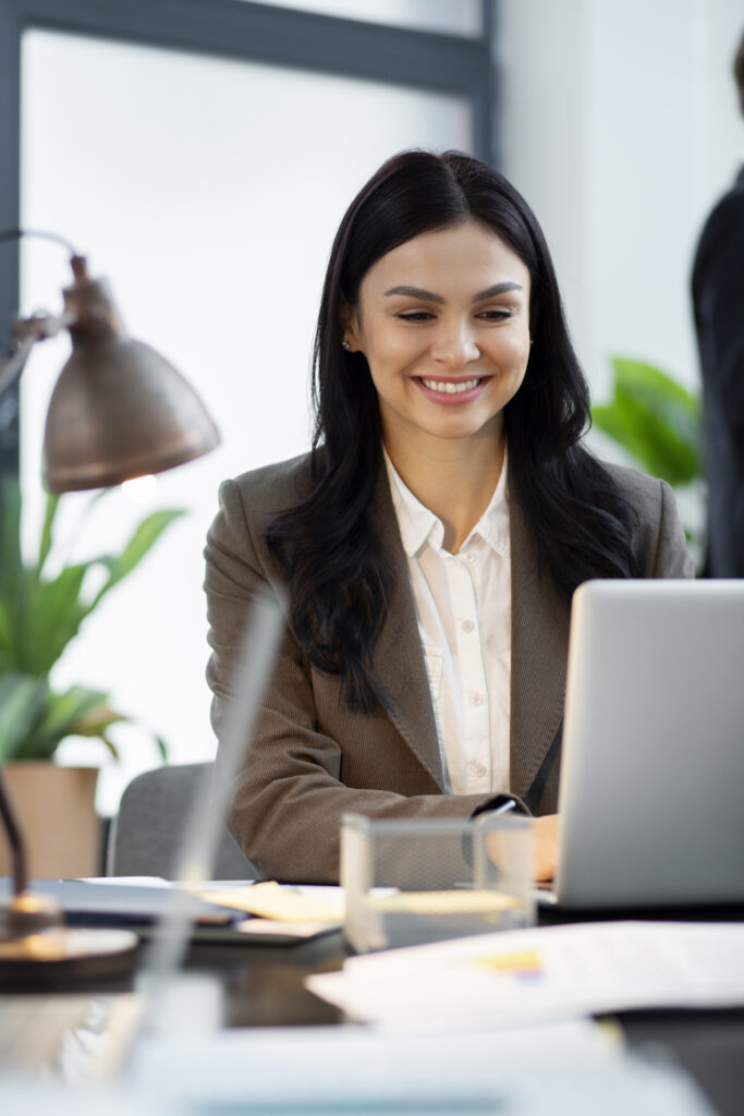 professional woman looking up and smiling